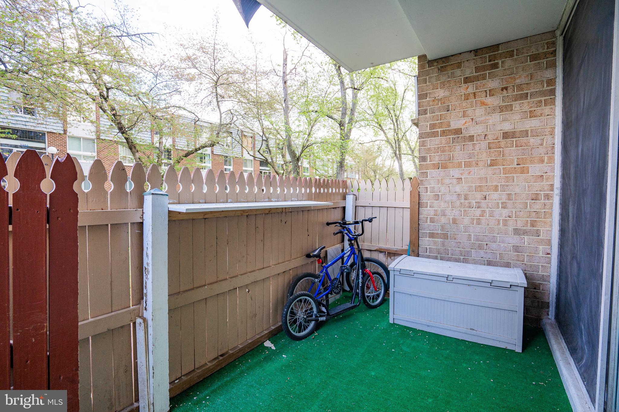 3960 Bel Pre Road, Unit 1 Silver Spring, MD 20906 - Photo 17 of 33 Cozy balcony with bike storage.