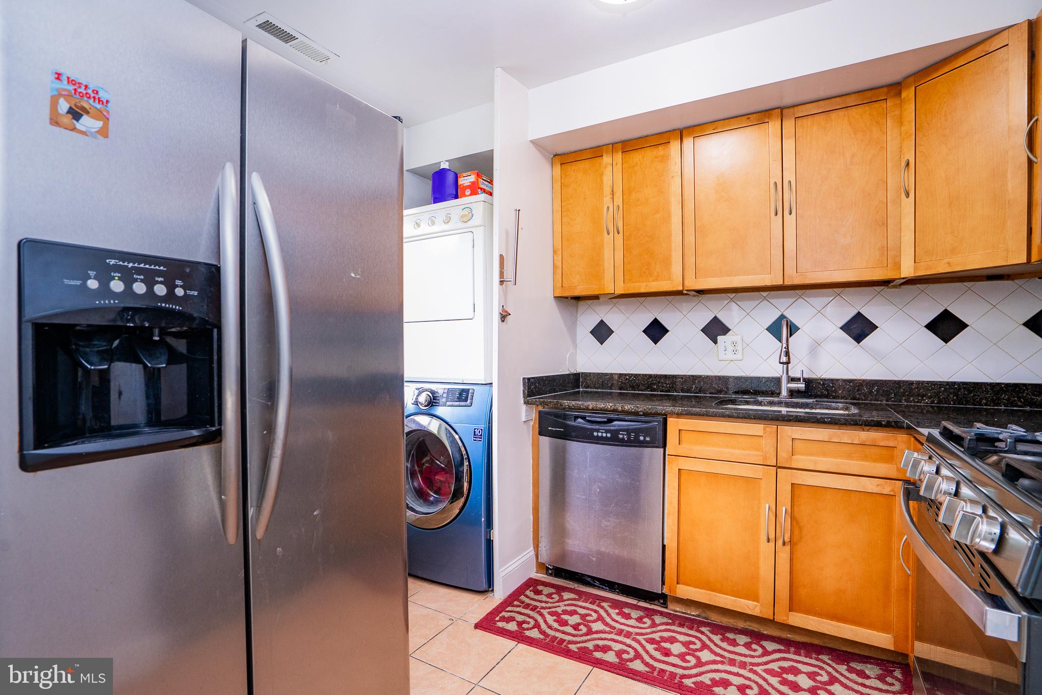 3960 Bel Pre Road, Unit 1 Silver Spring, MD 20906 - Photo 22 of 33 Modern kitchen with sleek appliances.