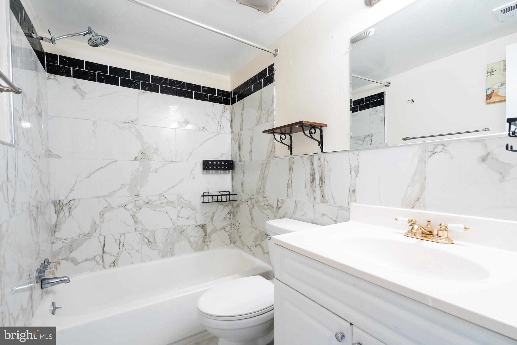3960 Bel Pre Road, Unit 1 Silver Spring, MD 20906 - Photo 31 of 33 Elegant marble bath retreat.
