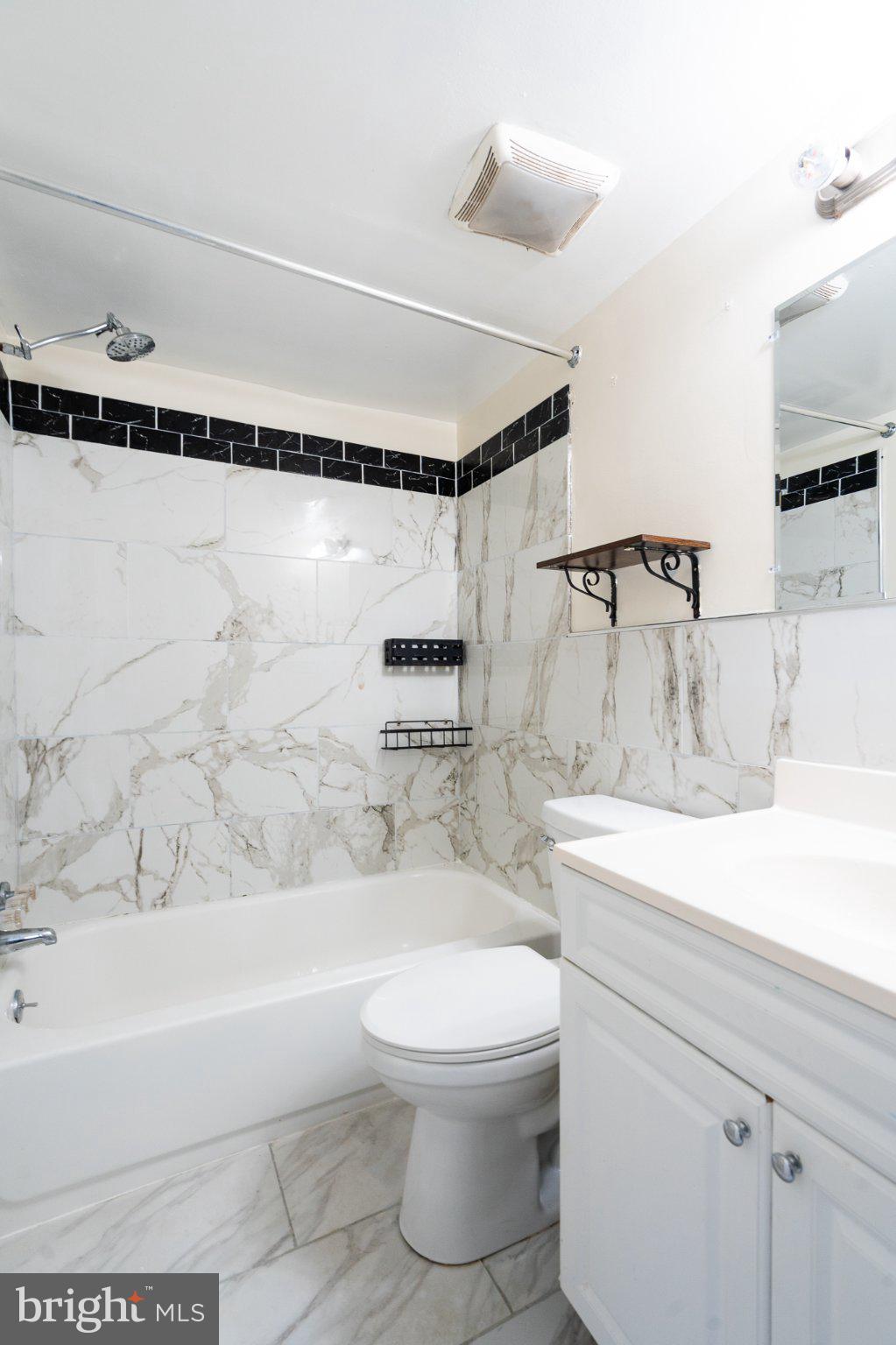 3960 Bel Pre Road, Unit 1 Silver Spring, MD 20906 - Photo 32 of 33 Elegant marble bathroom retreat.