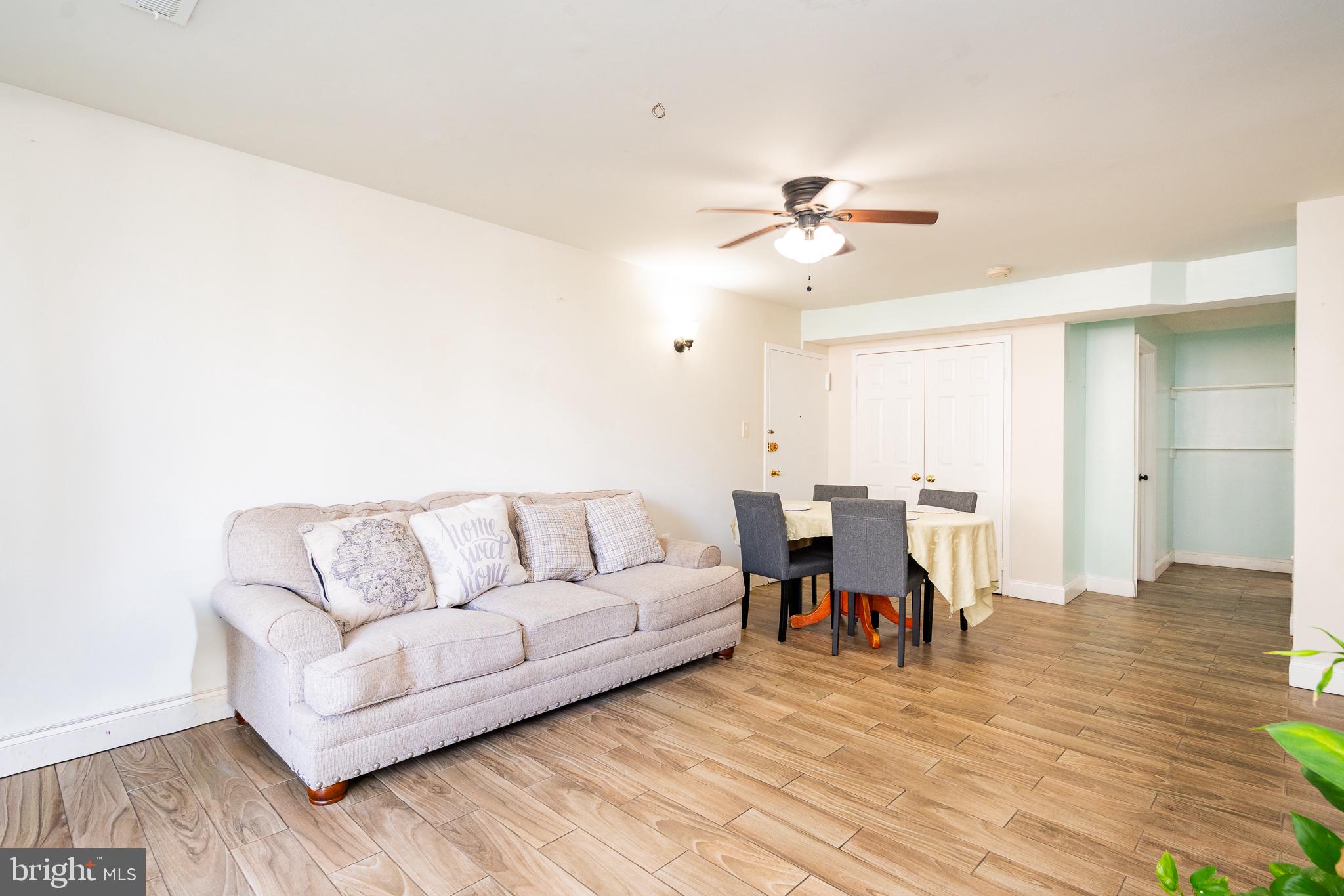 3960 Bel Pre Road, Unit 1 Silver Spring, MD 20906 - Photo 8 of 33 Spacious living area with modern charm.