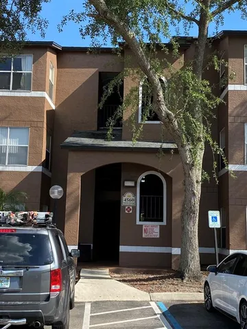 a car parked in front of a house
