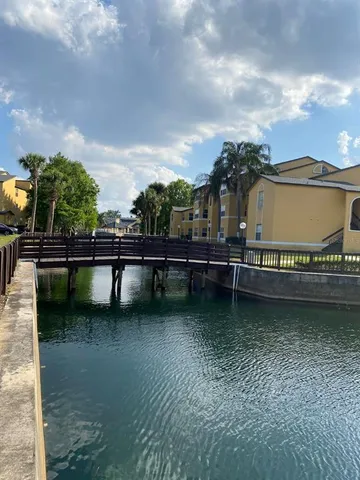 a view of a lake with a house