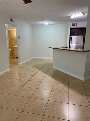 a view of a livingroom with wooden floor