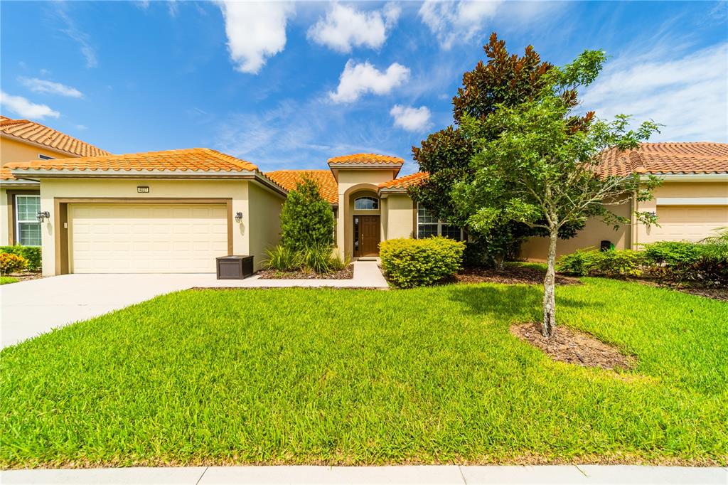 4027 Oakrise Loop Davenport, FL 33837 - Photo 60 of 66 a view of a house with a backyard