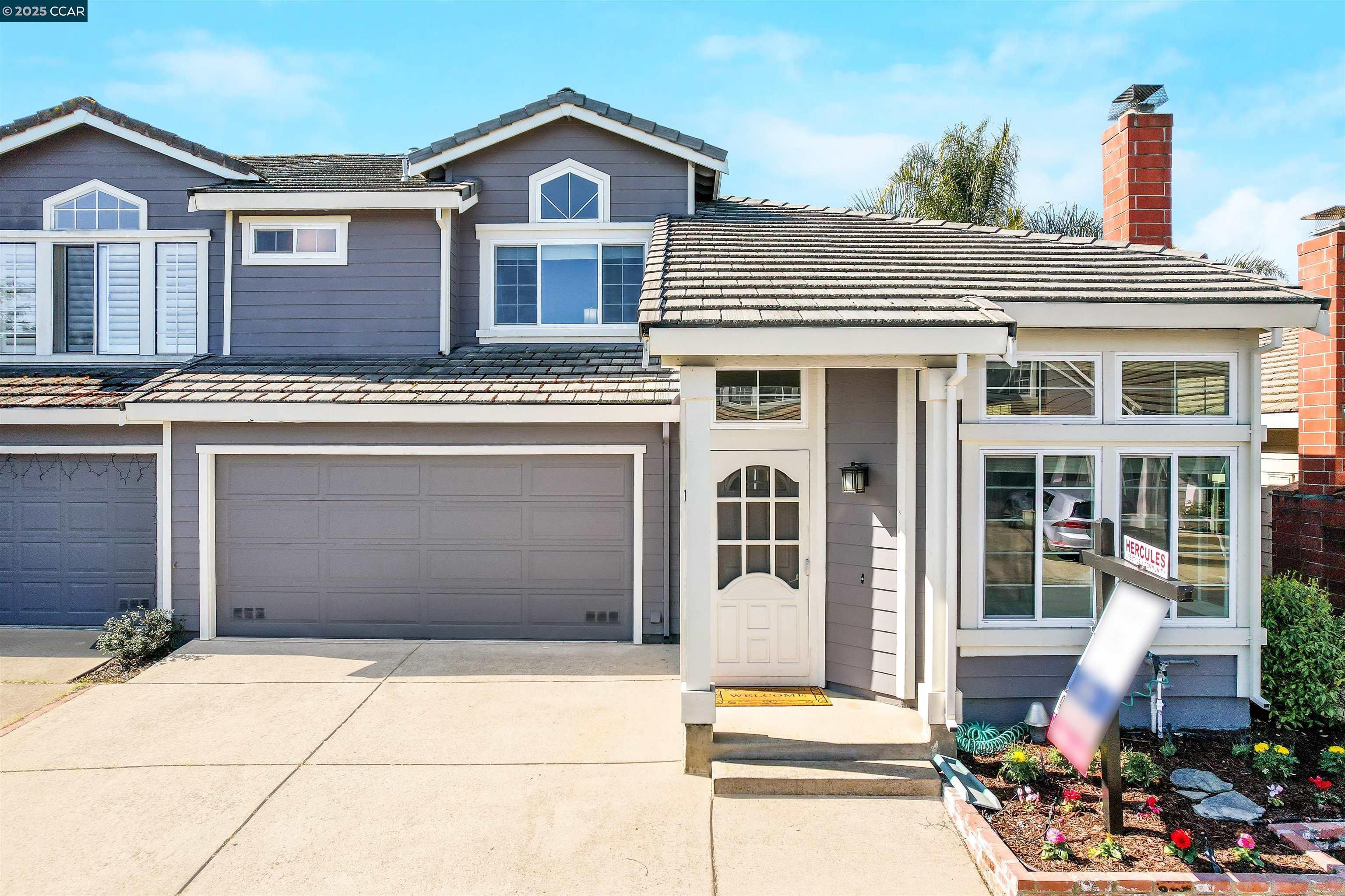 157 O'Neil Circle Hercules, CA 94547 - Photo 1 of 1 a front view of a house with a yard