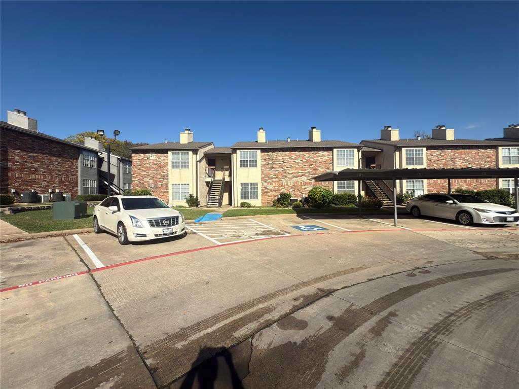12480 Abrams Road, Unit 2922 Dallas, TX 75243 - Photo 24 of 25 a car parked on the side of a street