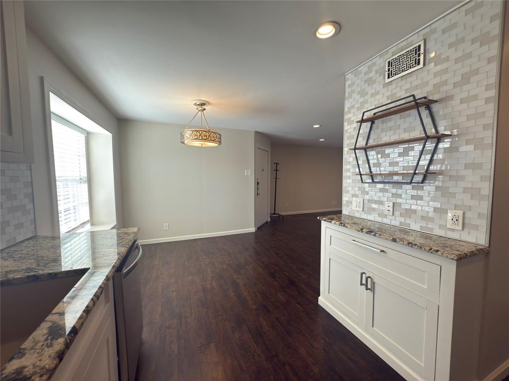 12480 Abrams Road, Unit 2922 Dallas, TX 75243 - Photo 10 of 25 a view of a kitchen cabinets and wooden floor