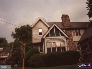 129 Ashby Road Upper Darby, PA 19082 - Photo 1 of 1 a front view of a house with a yard