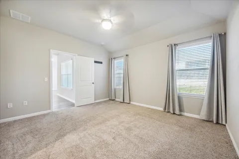 an empty room with windows