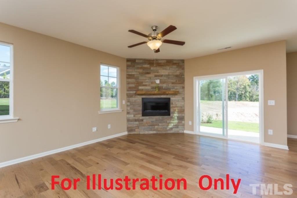 205 Zante Currant Road Durham, NC 27703 - Photo 9 of 25 a view of an empty room with a window