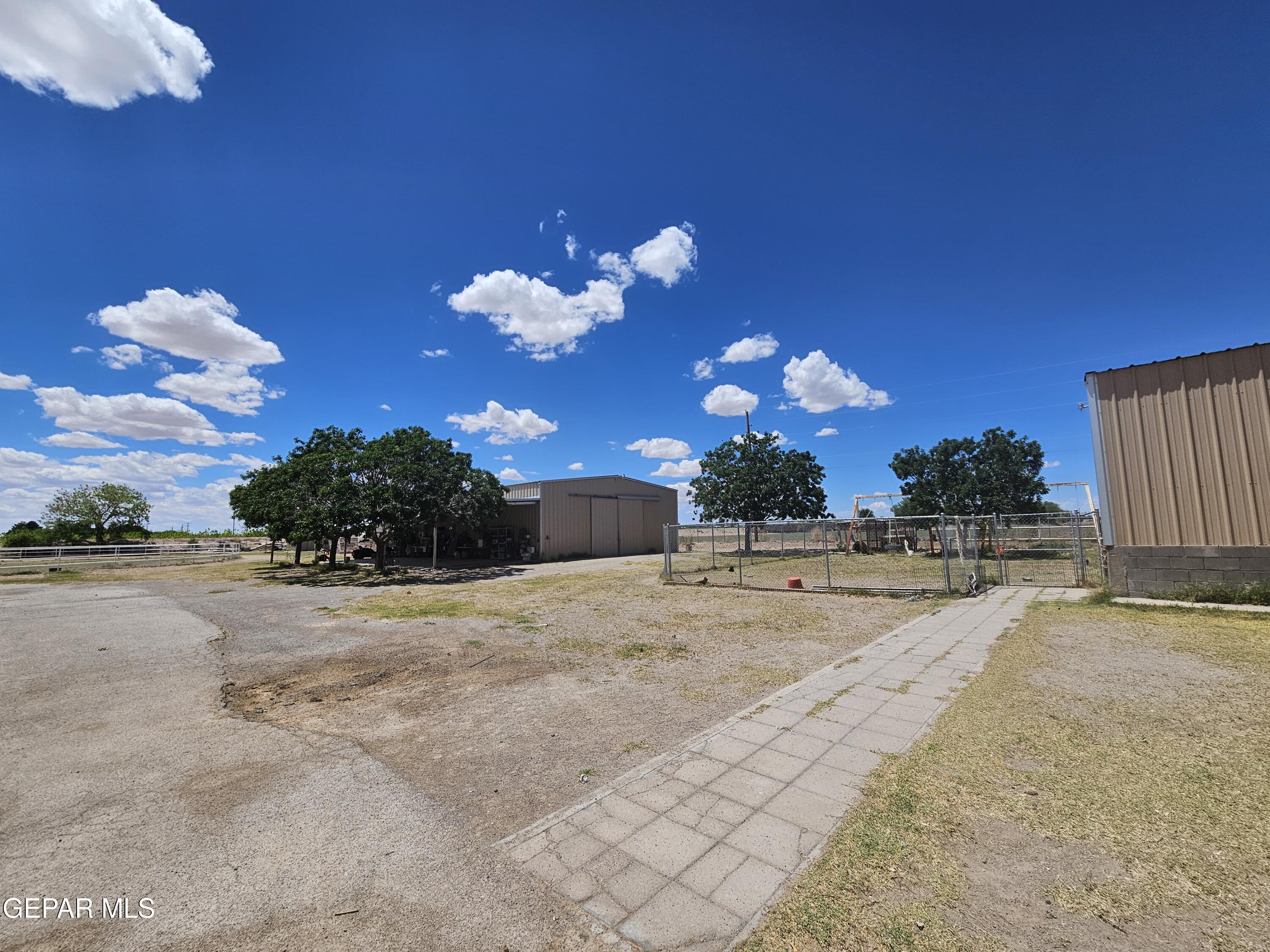 6651 Strahan Road El Paso, TX 79932 - Photo 12 of 60 a view of a backyard of a house