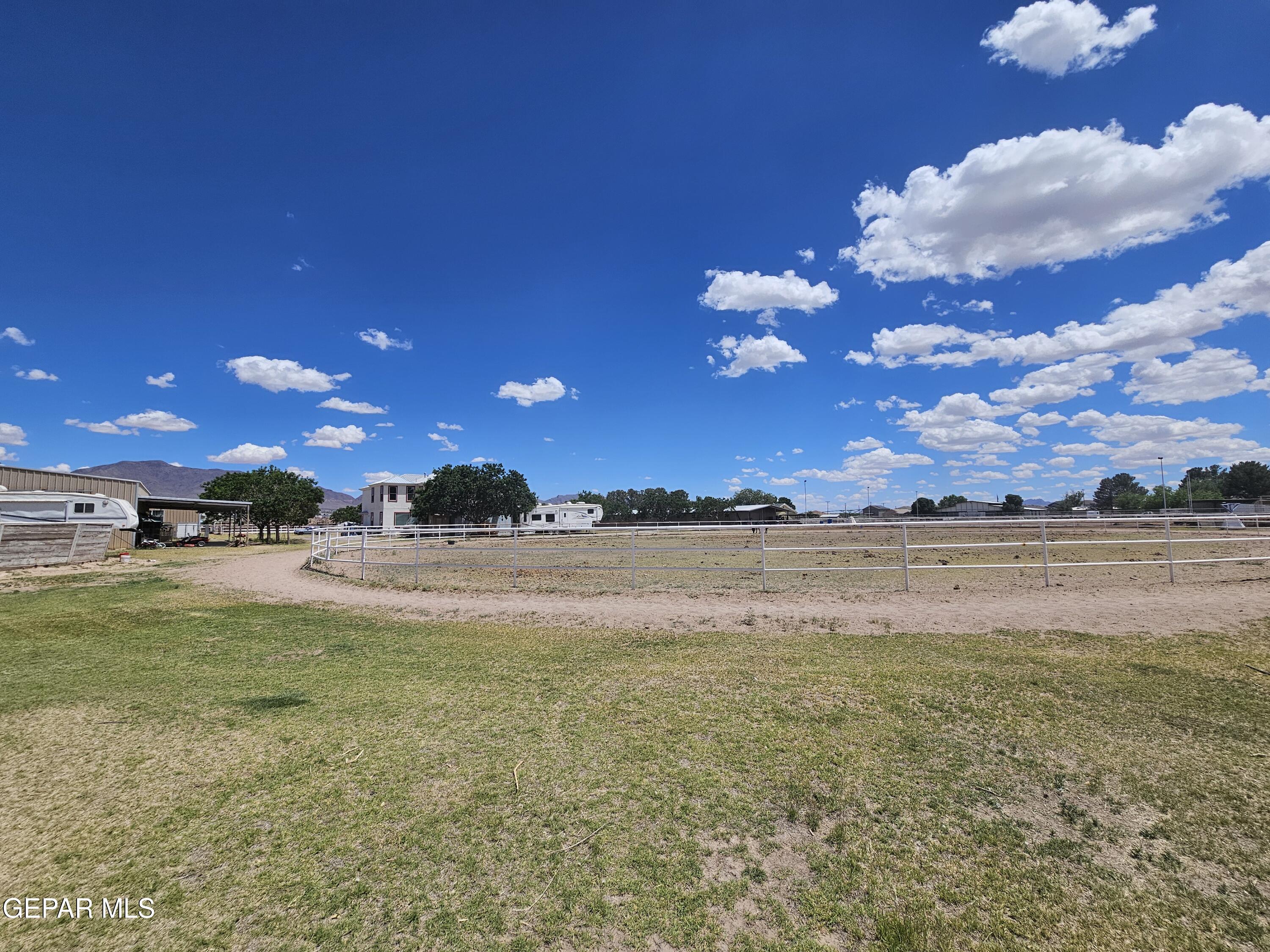 6651 Strahan Road El Paso, TX 79932 - Photo 17 of 60 a view of lake with sunset
