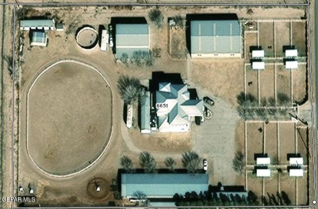 6651 Strahan Road El Paso, TX 79932 - Photo 2 of 60 an aerial view of a highlighted house