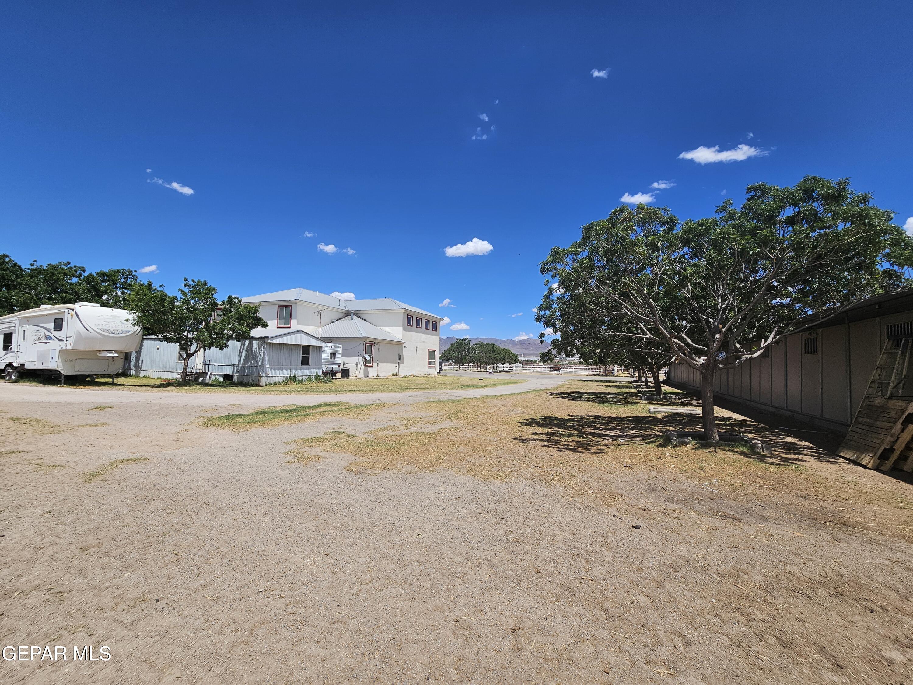 6651 Strahan Road El Paso, TX 79932 - Photo 22 of 60 a view of street with parked cars