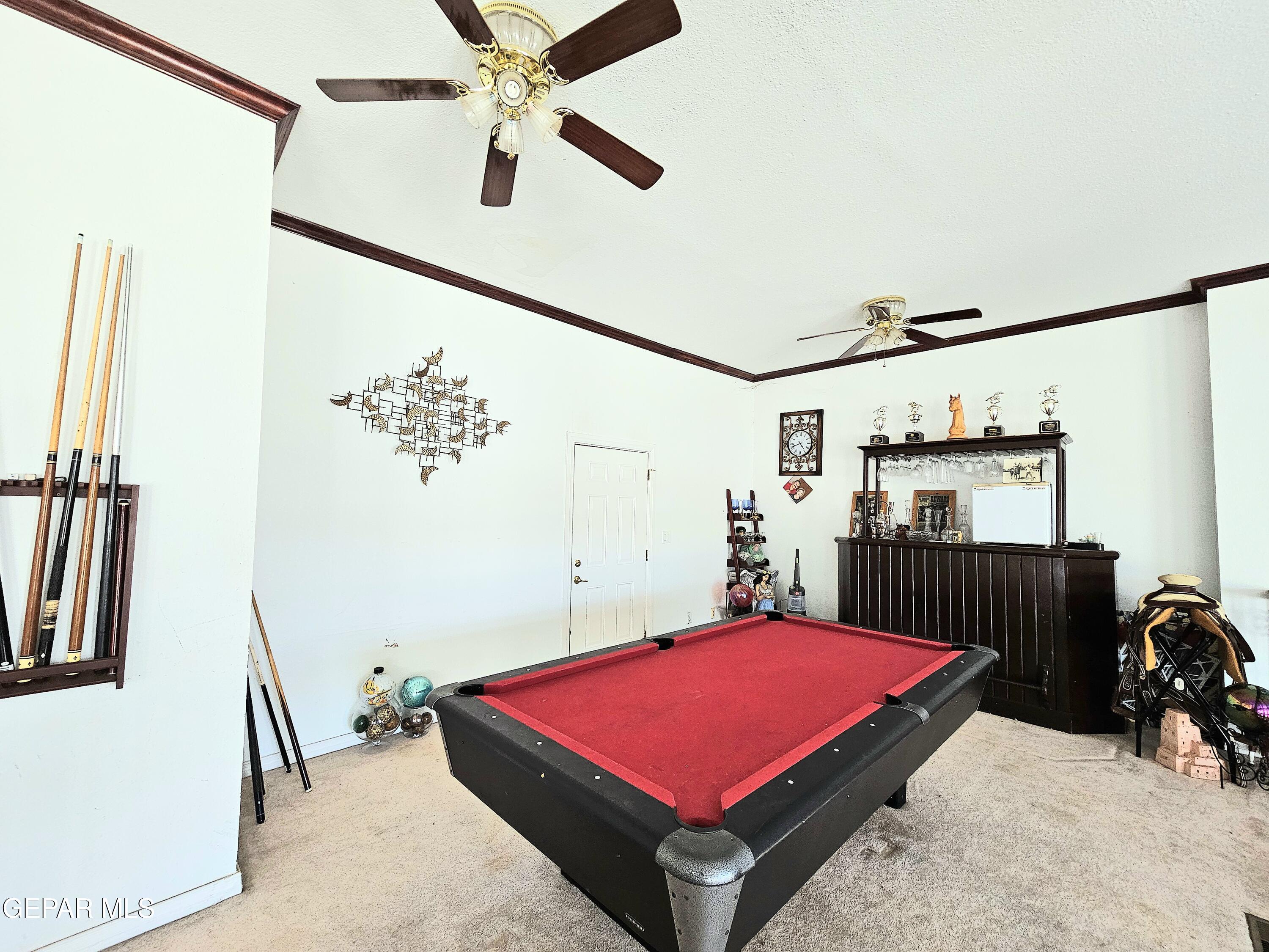 6651 Strahan Road El Paso, TX 79932 - Photo 51 of 60 a living room with furniture pool table and window