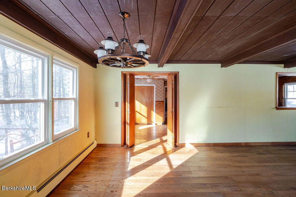 470 Main Road Monterey, MA 01245 - Photo 23 of 44 a view of an empty room with a window