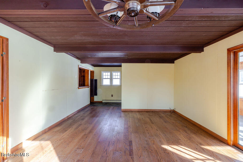 470 Main Road Monterey, MA 01245 - Photo 28 of 44 a view of empty room with wooden floor