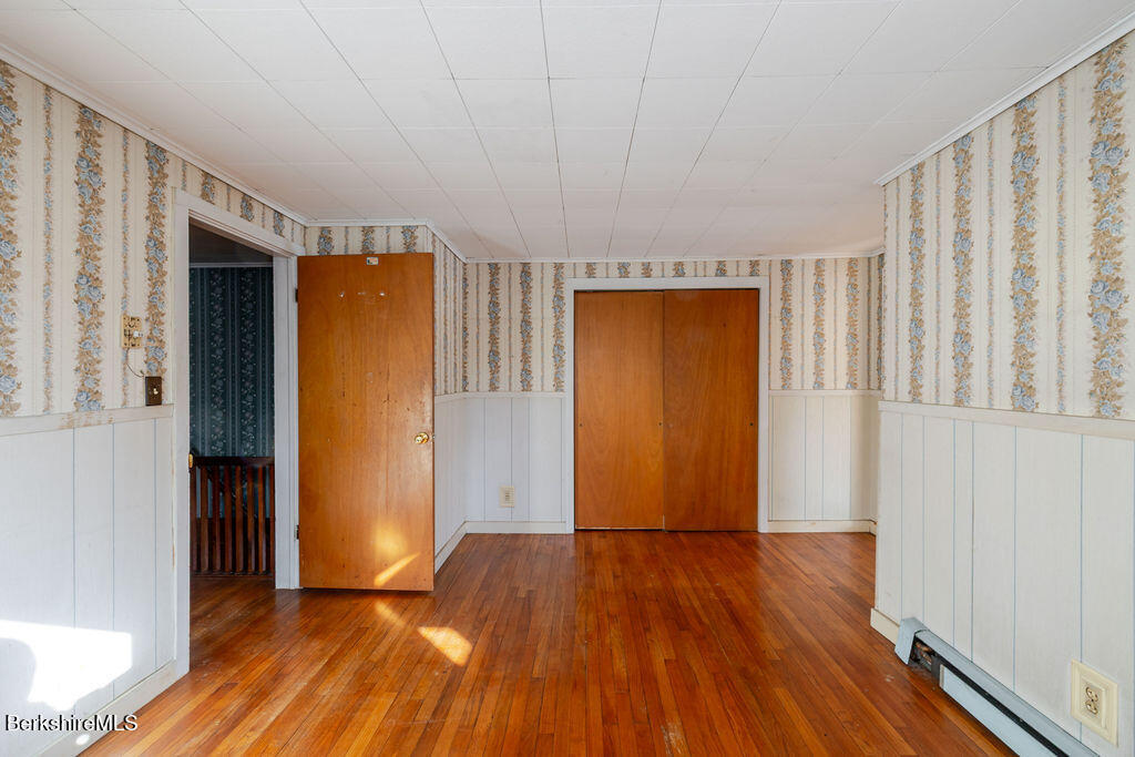 470 Main Road Monterey, MA 01245 - Photo 36 of 44 a view of empty room with wooden floor