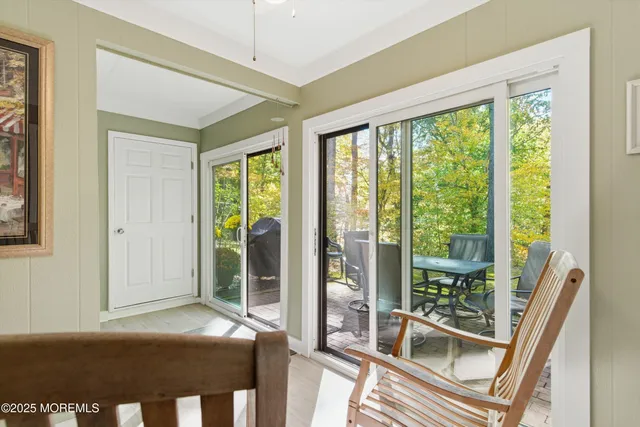 a view of a room with a large window