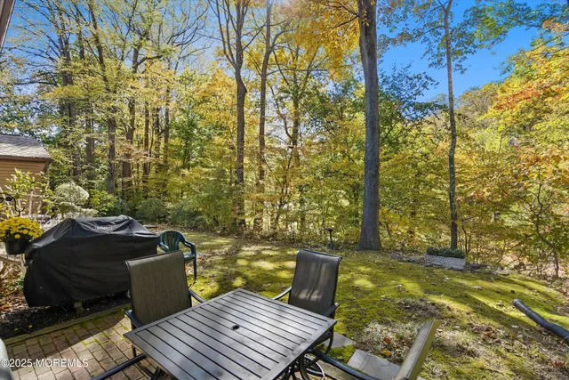 a view of a balcony with two chairs