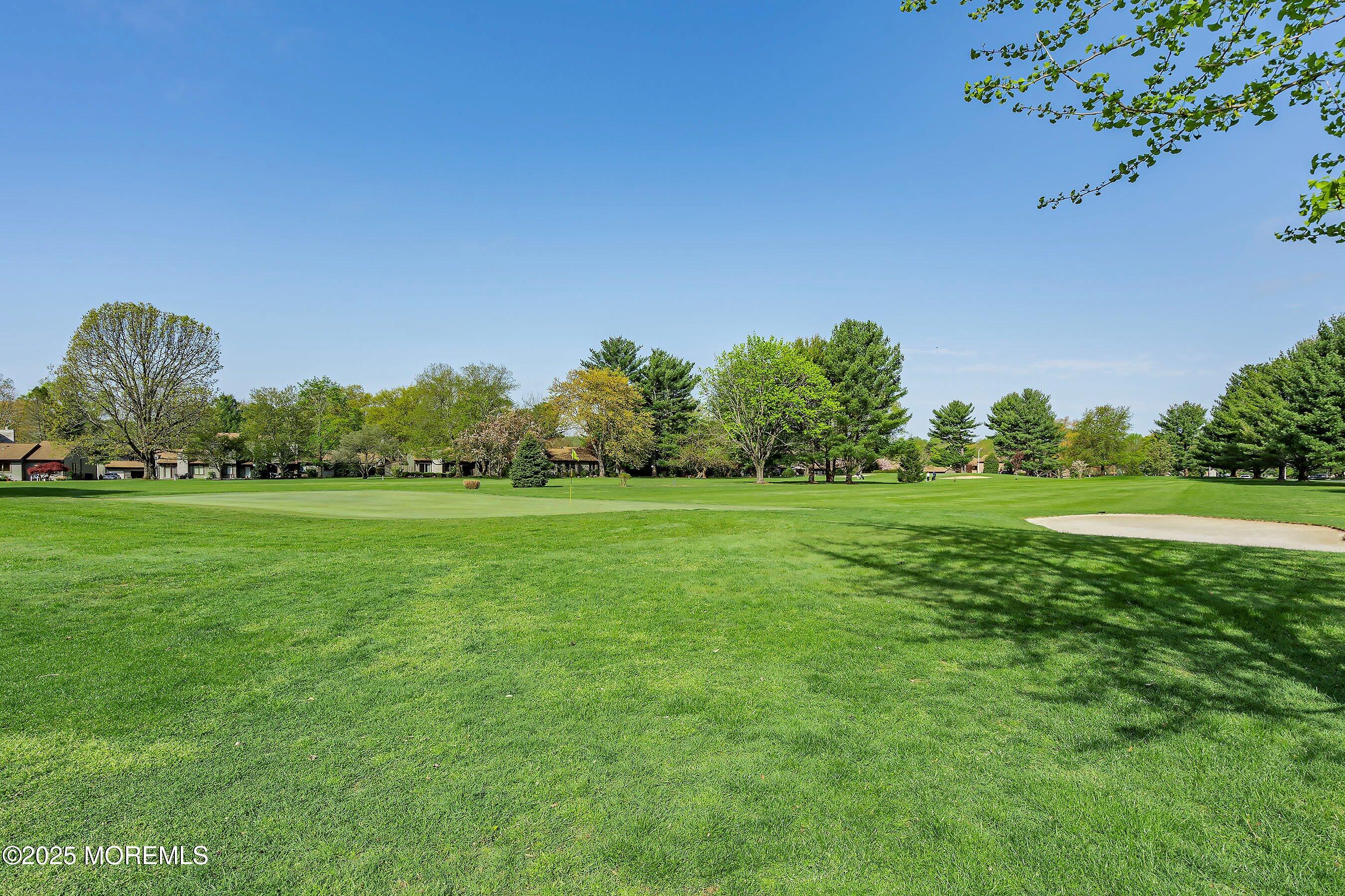 32 Ellsworth Court Red Bank, NJ 07701 - Photo 27 of 32 a view of a green field with wooden fence