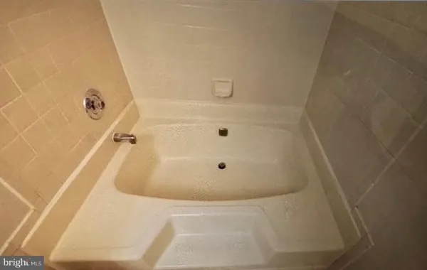 a bathroom with a tub
