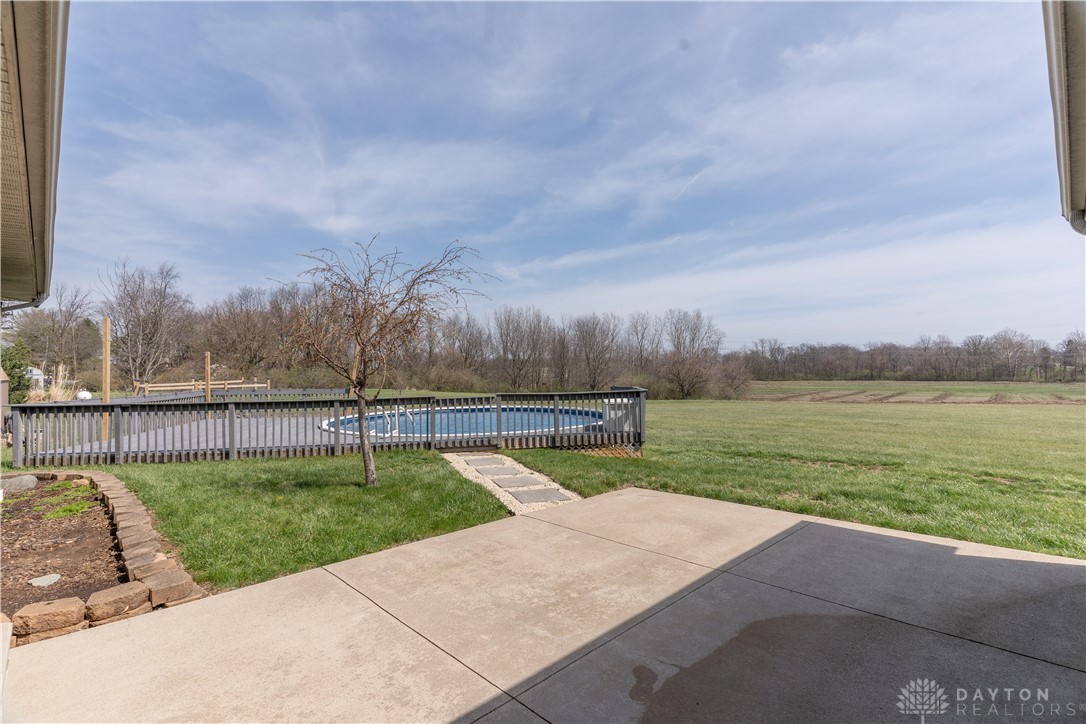 5264 Frazier-Guy Road Sidney, OH 45365 - Photo 44 of 51 This expansive backyard offers a perfect retreat with a pool and scenic natural views.