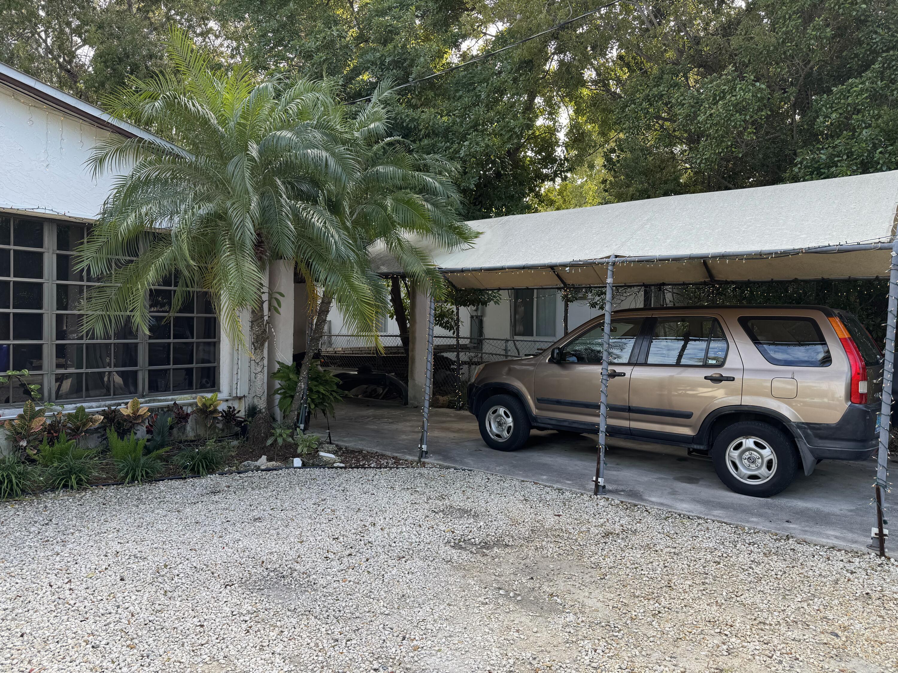 1610 Laird Street Key West, FL 33040 - Photo 13 of 20 a view of a car parked in front of a house