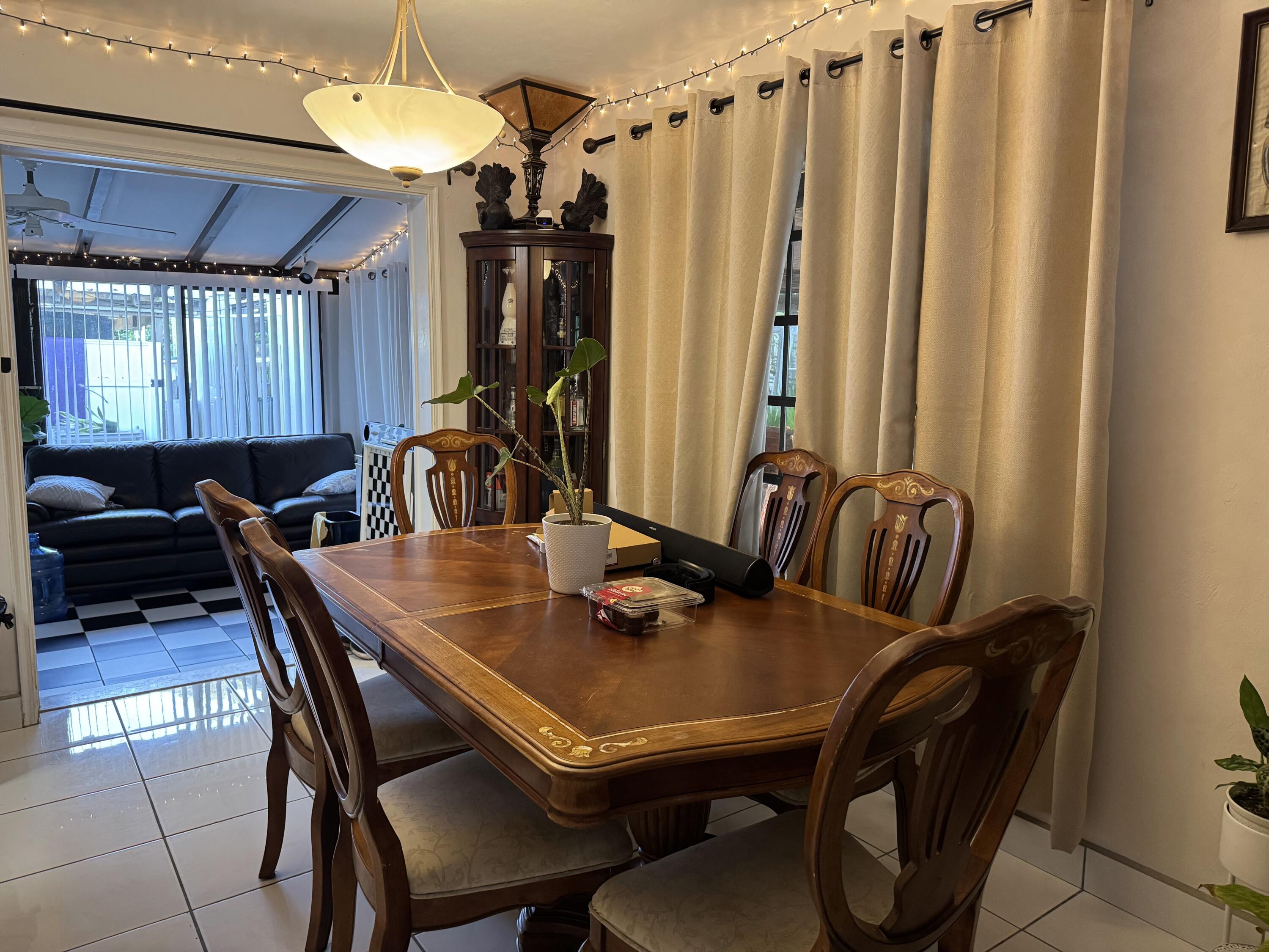 1610 Laird Street Key West, FL 33040 - Photo 18 of 22 a view of a dining room with furniture