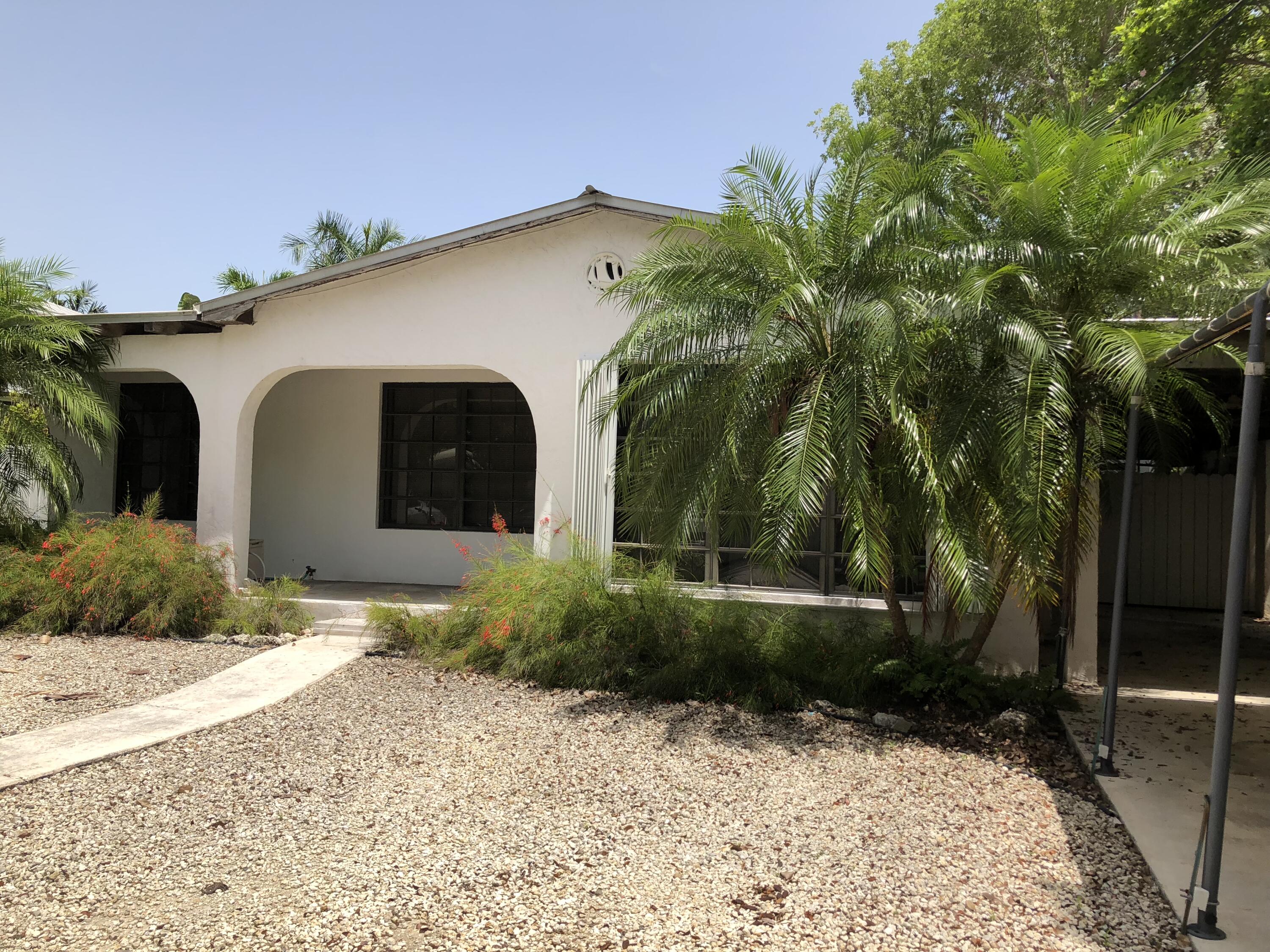 1610 Laird Street Key West, FL 33040 - Photo 2 of 20 a view of a house with a yard