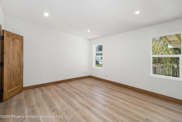 an empty room with windows