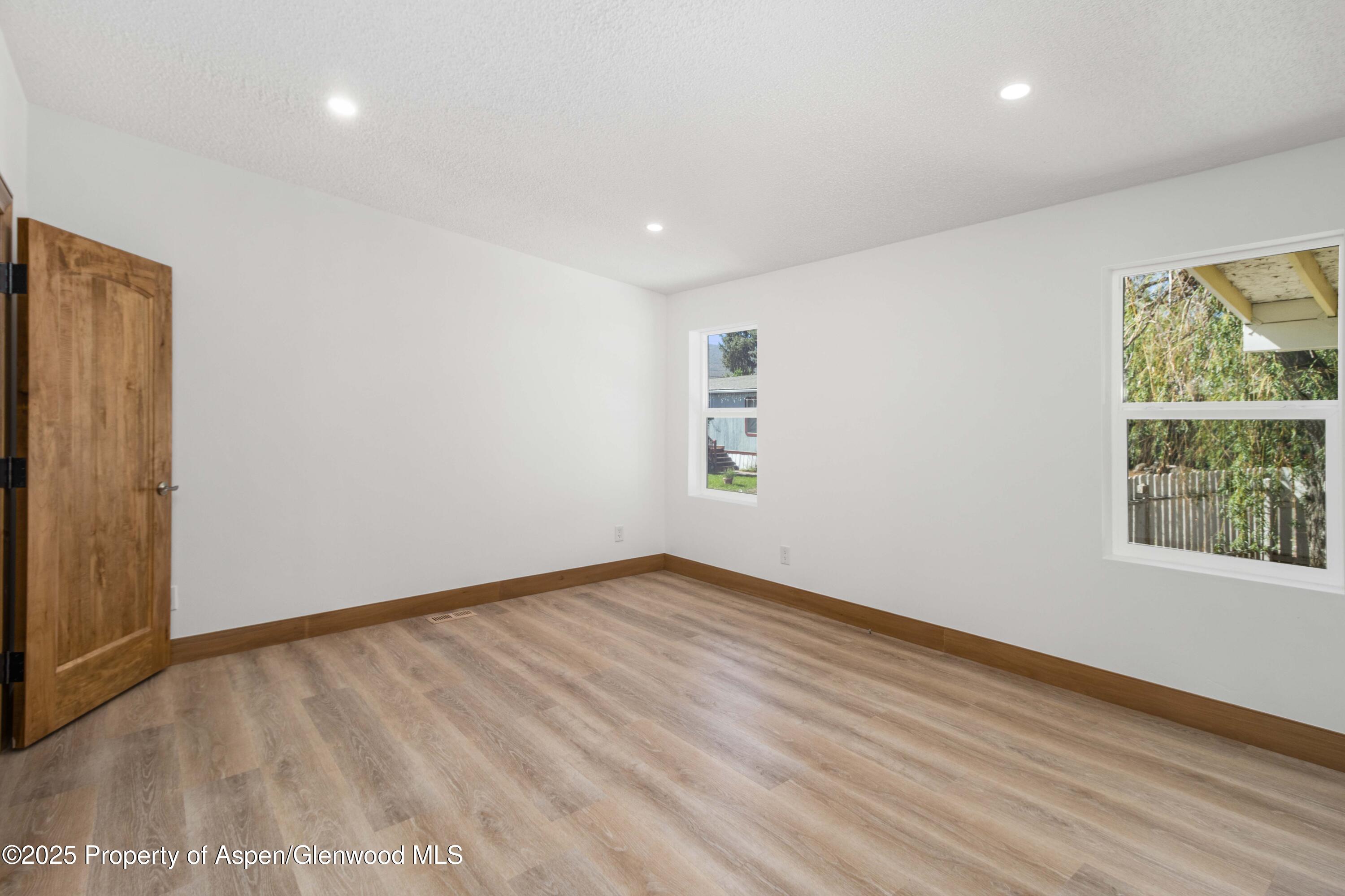 161 James Circle El Jebel, CO 81623 - Photo 9 of 24 an empty room with windows