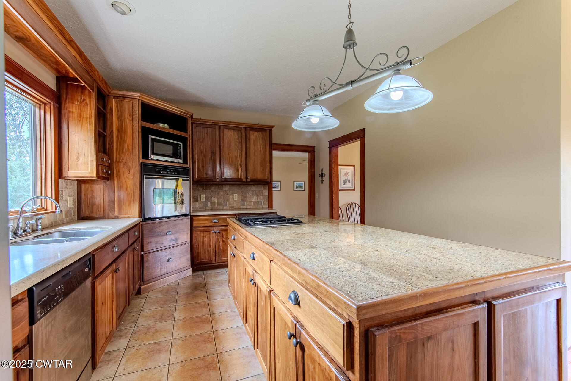 3554 Shades Bridge Road Greenfield, TN 38230 - Photo 8 of 49 a kitchen that has a lot of cabinets in it