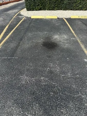 a view of empty room with floor to ceiling window