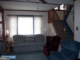 35 Princeton Road Audubon, NJ 08106 - Photo 2 of 6 a living room with furniture and a window