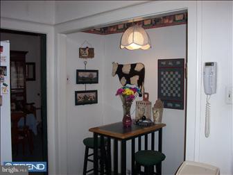 35 Princeton Road Audubon, NJ 08106 - Photo 6 of 6 a view of a hallway stairs and dining room