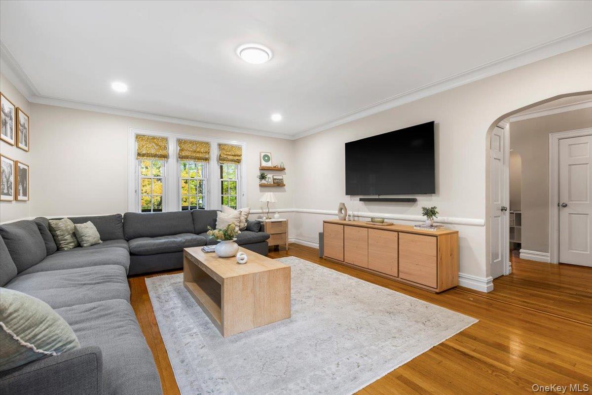 620 Timpson Street Pelham, NY 10803 - Photo 11 of 32 a living room with furniture and a flat screen tv