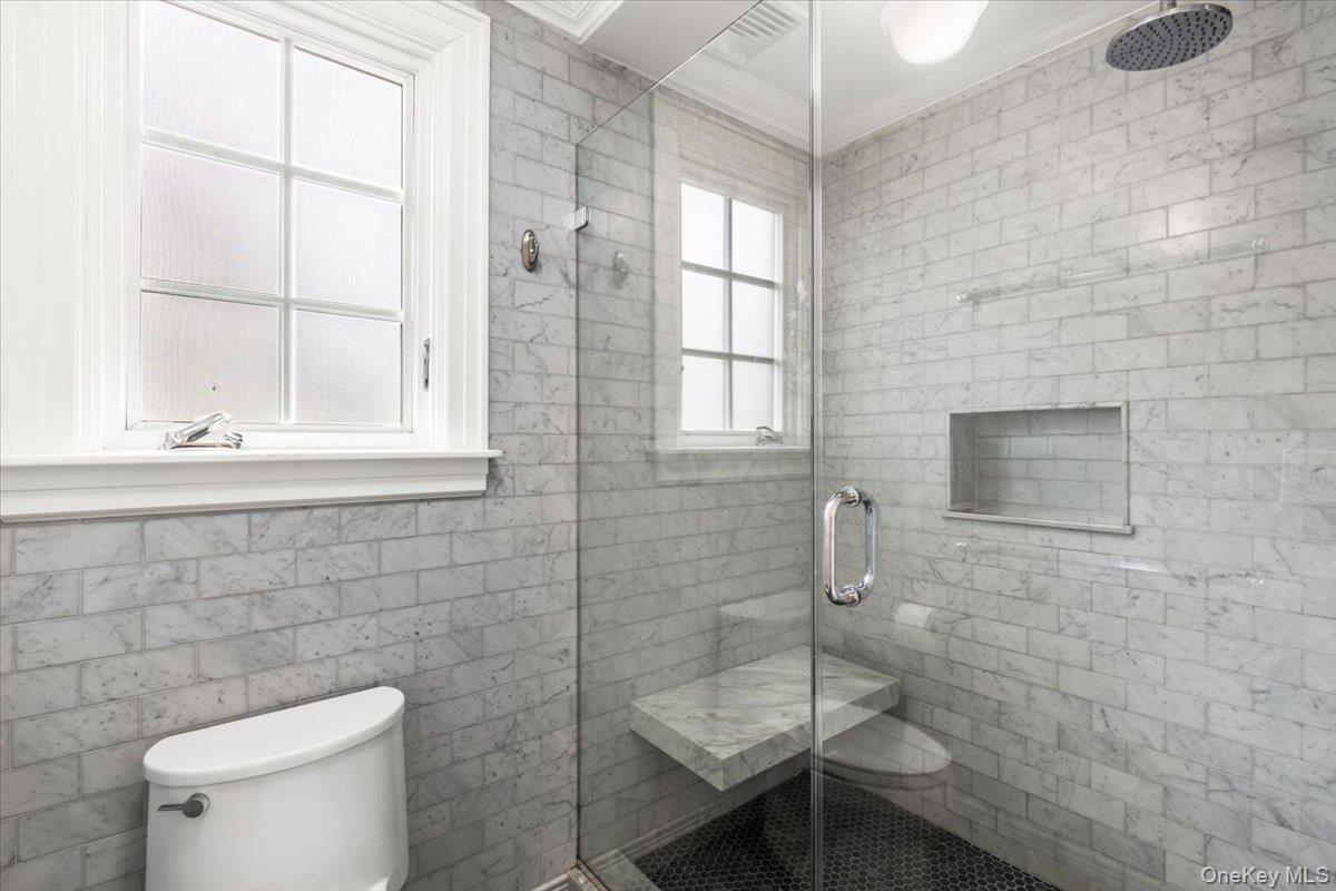 620 Timpson Street Pelham, NY 10803 - Photo 16 of 32 a bathroom with a toilet and a sink