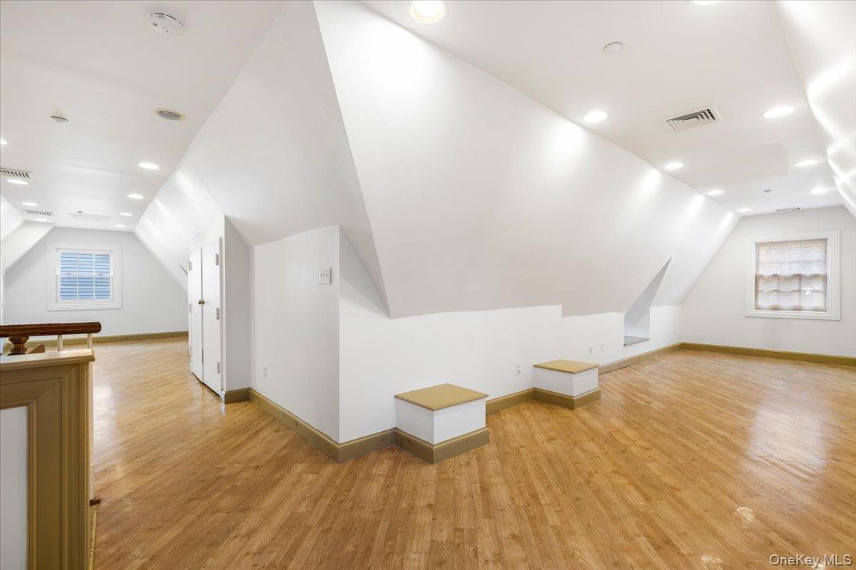 620 Timpson Street Pelham, NY 10803 - Photo 20 of 32 a view of a kitchen with furniture and wooden floor