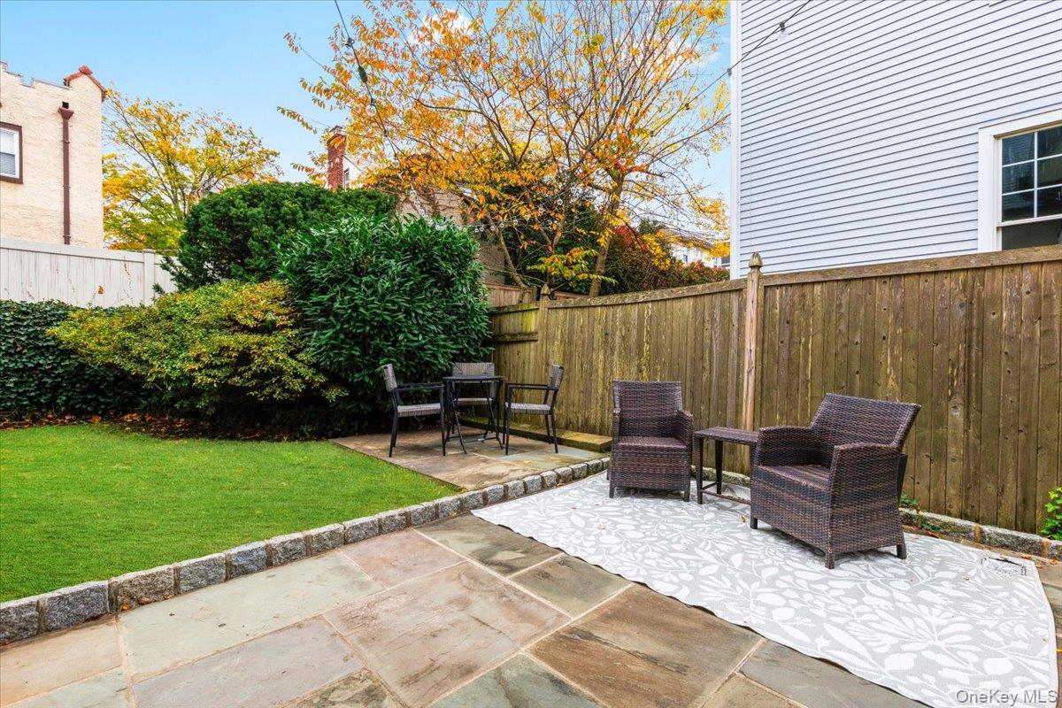 620 Timpson Street Pelham, NY 10803 - Photo 27 of 32 a backyard of a house with seating space