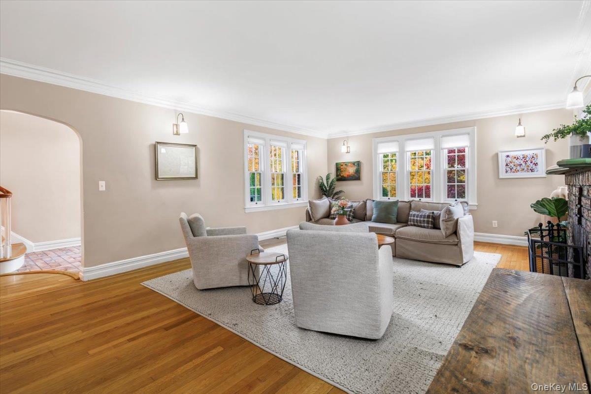 620 Timpson Street Pelham, NY 10803 - Photo 3 of 32 a living room with furniture and a wooden floor