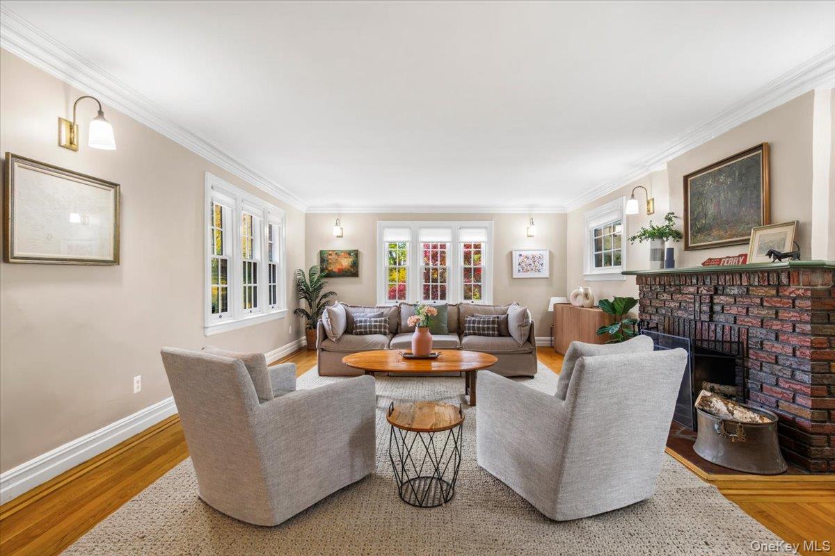 620 Timpson Street Pelham, NY 10803 - Photo 4 of 32 a living room with fireplace furniture and a fireplace