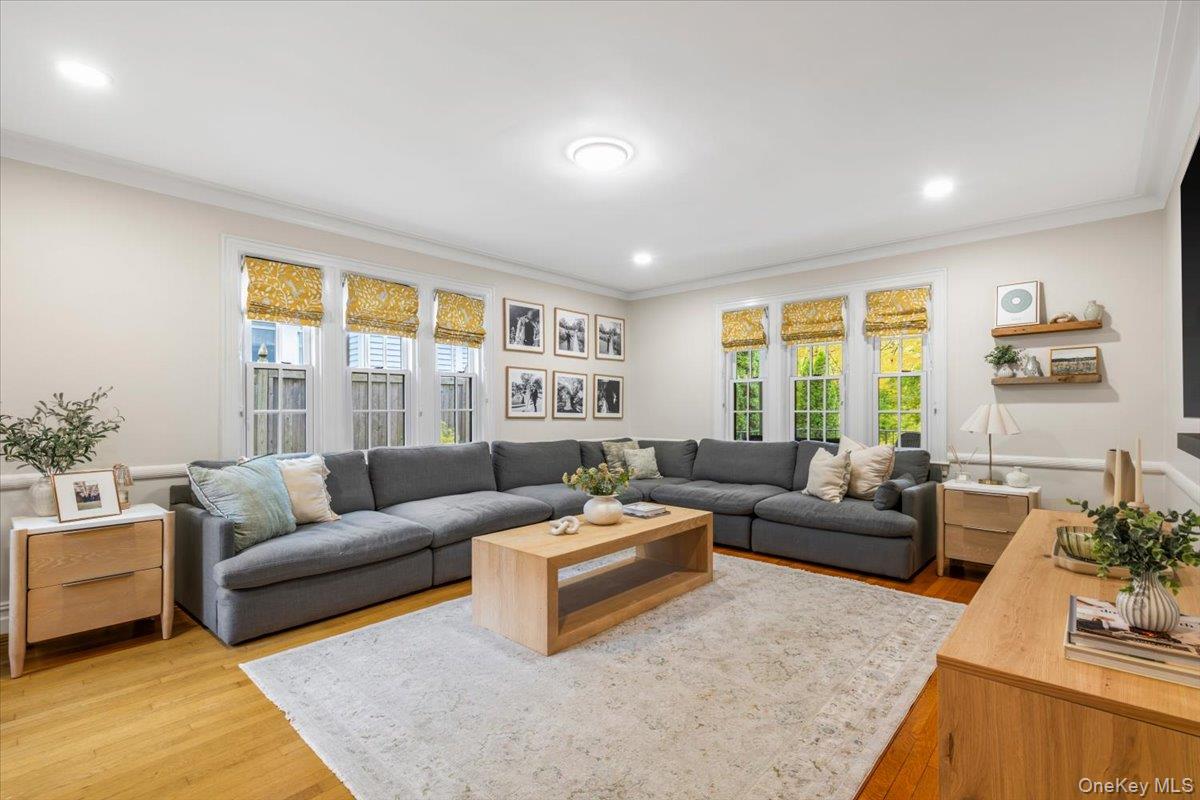 620 Timpson Street Pelham, NY 10803 - Photo 10 of 32 a living room with furniture and a large window
