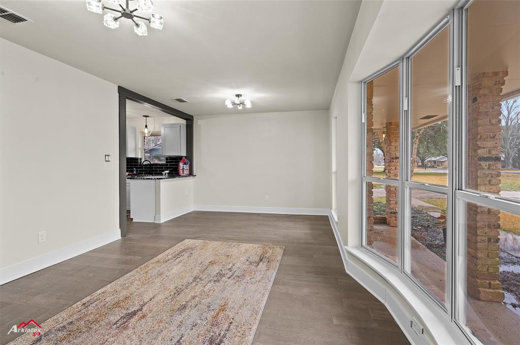 5524 Hickory Ridge Drive Bossier City, LA 71111 - Photo 13 of 17 a view of a kitchen with a sink and a refrigerator