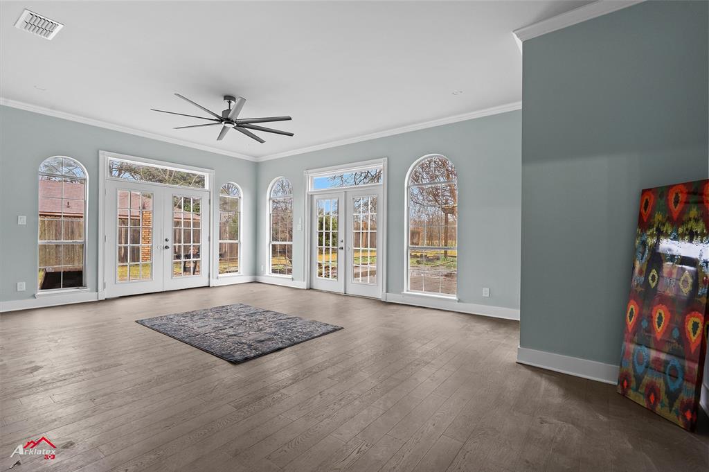5524 Hickory Ridge Drive Bossier City, LA 71111 - Photo 6 of 17 a view of an empty room with a window and wooden floor