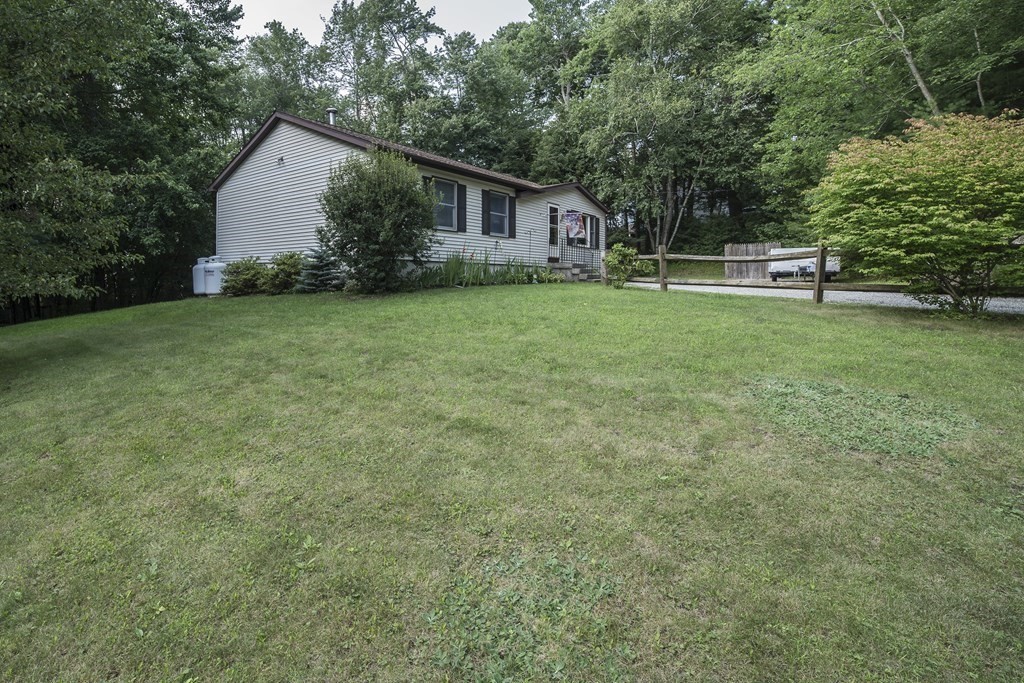 23 Sczygiel Road Ware, MA 01082 - Photo 3 of 41 a view of house with backyard and garden