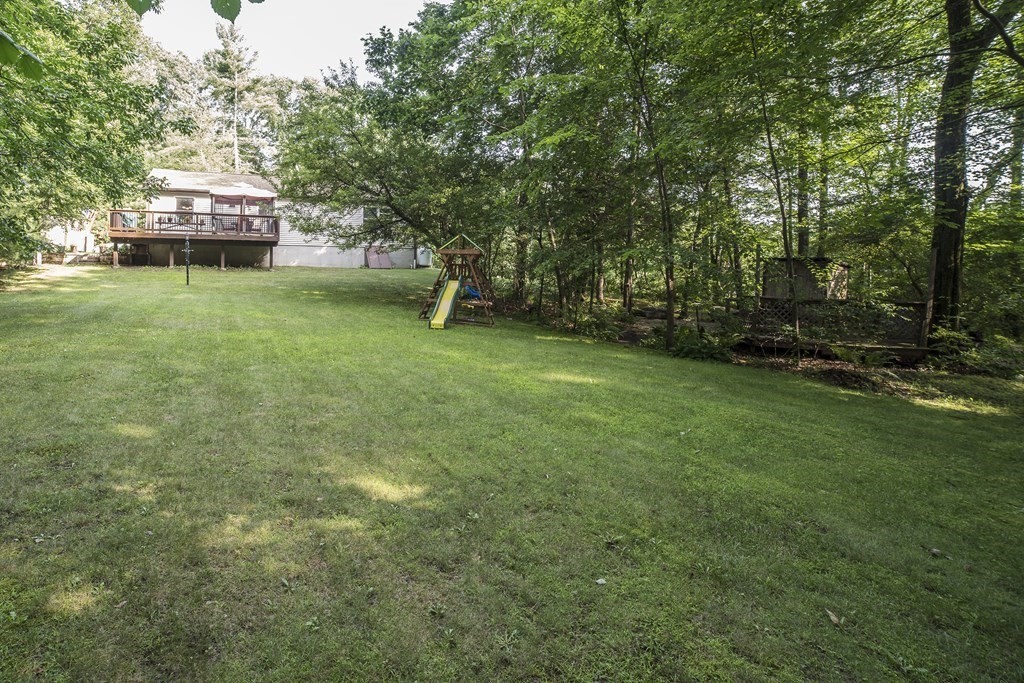 23 Sczygiel Road Ware, MA 01082 - Photo 8 of 41 a view of a backyard with a garden and trees