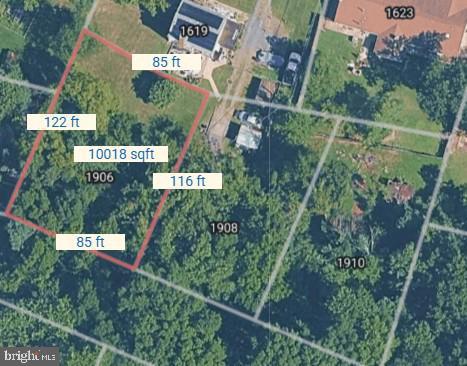 Knoll Drive Oxon Hill, MD 20745 - Photo 3 of 10 an aerial view of houses with an outdoor space