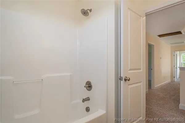 a bathroom with a bathtub